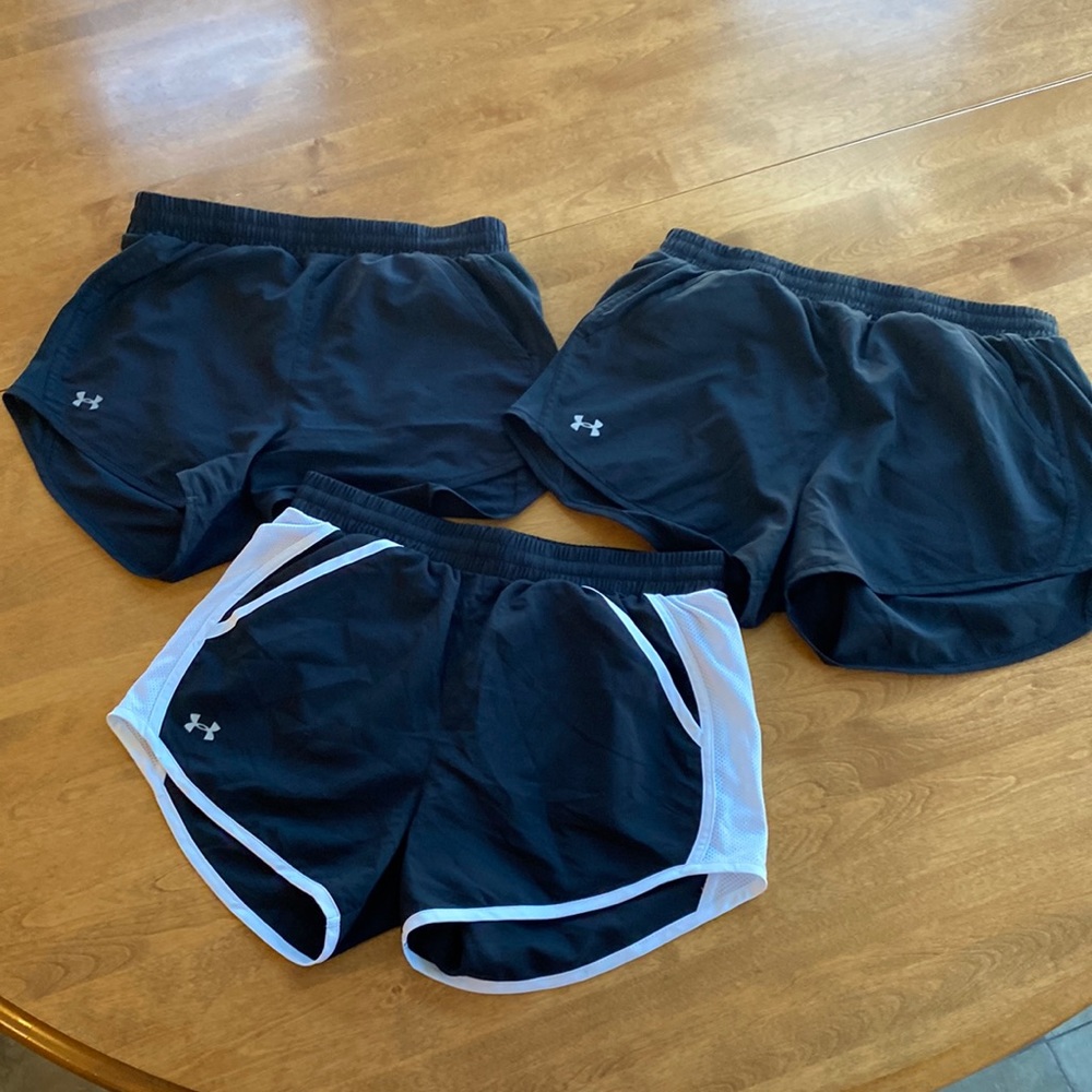 Three UA shorts